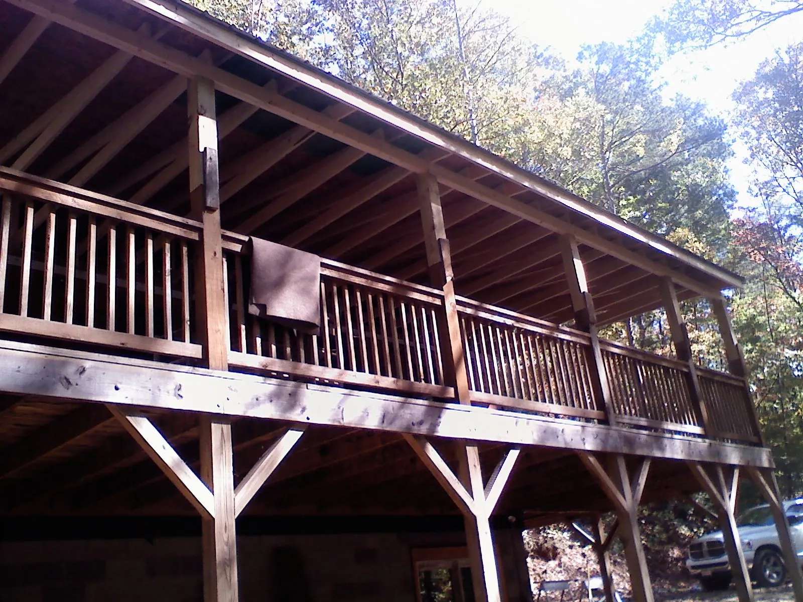 Timber framing under a new elevated porch and deck — Roof Leak Repair in Woodland Hills by Roofing Brothers